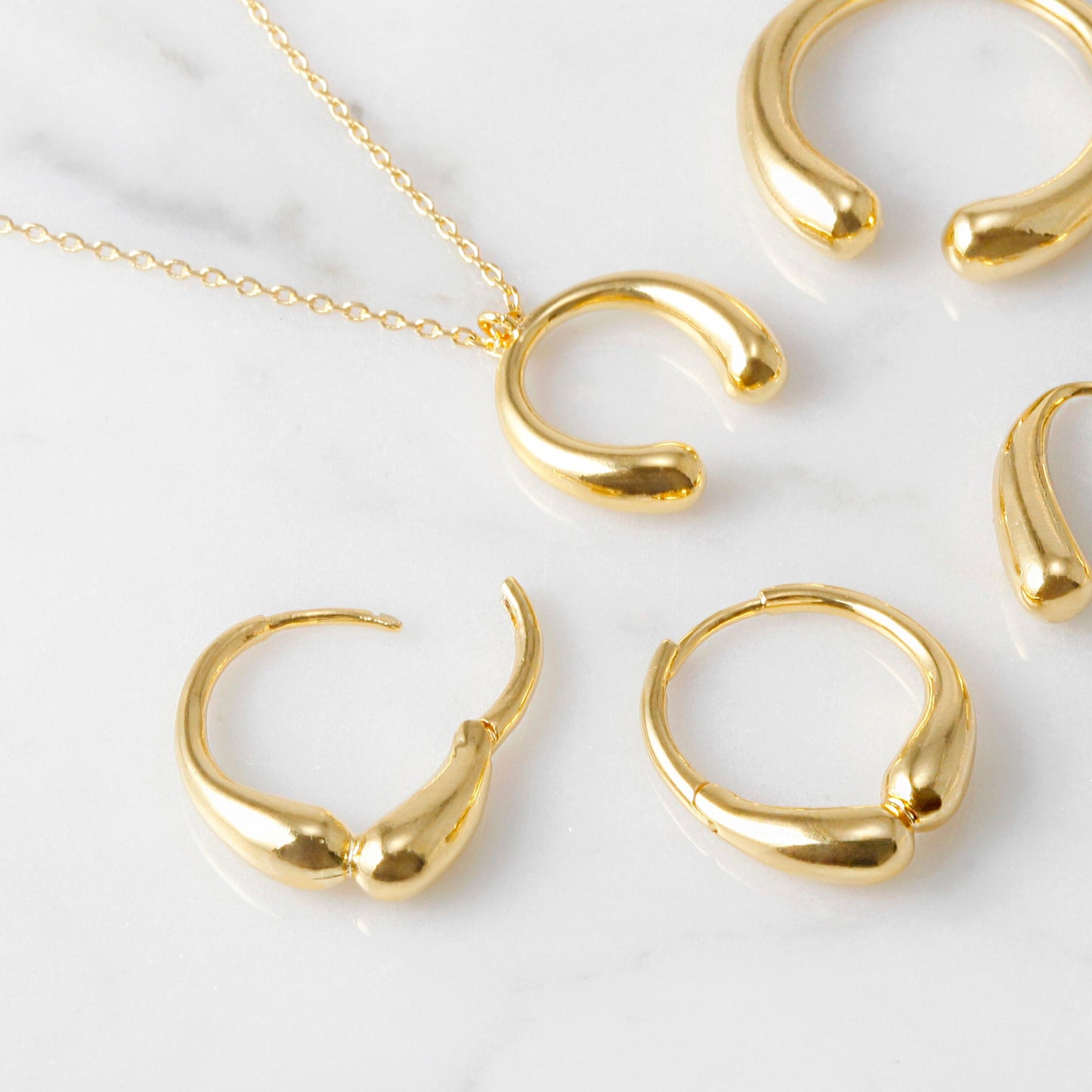 Embrace Teardrop Hoops